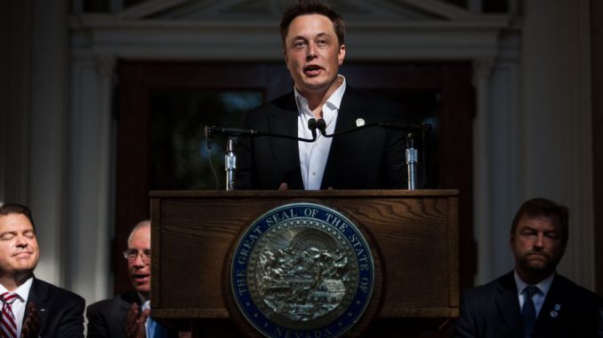 Elon Musk, CEO of Tesla Motors, speaks at a press conference at the Nevada State Capitol, September 4, 2014, in Carson City, Nevada. Musk and Sandoval announced a plan to build a Tesla Gigafactory in Nevada to produce batteries for electric vehicles providing 6,500 jobs to the state. MAX WHITTAKER/BENZINGA 