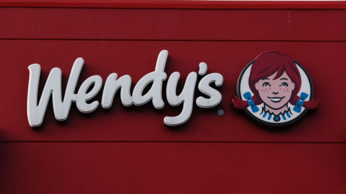 Exterior view of a Wendy's restaurant on April 17, 2023, in Rutherford New Jersey. Wendy's will begin testing an AI-powered ordering system powered by Google Clouds AI software that will have customers talking to a computer in order to reduce labor costs. KENA BETANCUR/BENZINGA