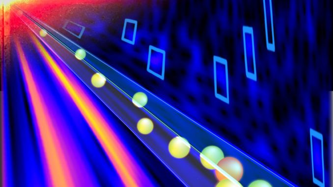 Researchers have developed new signal-processing techniques that were used with an optofluidic biosensor chip to detect a mixture of nanobeads across concentrations that varied by eight orders of magnitude. PHOTO BY HOLGER SCHMIDT/ECE DEPARTMENT, UNIVERSITY OF CALIFORNIA