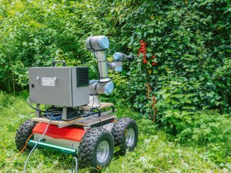 The tomato picker robot designed with ChatGPT by researchers from TU Delft and EPFL moves through a testing environment. PHOTO BY ADRIEN BUTTIER/SWNS 