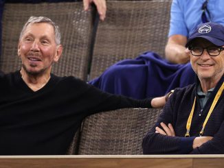 (L-R) Larry Ellison and Bill Gates watch a match between Gael Monfils of France and Alexander Zverev of Germany on Day 10 of the BNP Paribas Open at the Indian Wells Tennis Garden on October 13, 2021 in Indian Wells, California. In the recent developments, the surge in artificial intelligence (AI) has not only propelled Oracle Corp.'s (NYSE:a href=https://www.Zenger News.com/stock/ORCL#NYSEORCL/a) stock to record highs but also boosted the net worth of its founder, Larry Ellison, to unprecedented levels.  PHOTO BY SEAN M.HAFFEY/GETTY IMAGES