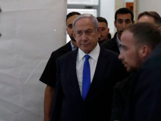 Israeli Prime Minister Benjamin Netanyahu arrives at the District Court in Jerusalem on June 25, 2023, to follow Hollywood producer Arnon Milchan by videoconference from Brighton, testifying at a trial involving Netanyahu. (ATEF SAFADI/POOL/AFP via Getty Images)