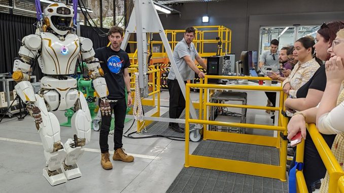 Woodside Energy team receiving orientation and training with NASA support. The Valkyrie bot is being dispatched to Australia to be deployed by an energy company to test its ability to handle dirty and hazardous conditions. PHOTO BY NASA/SWNS  