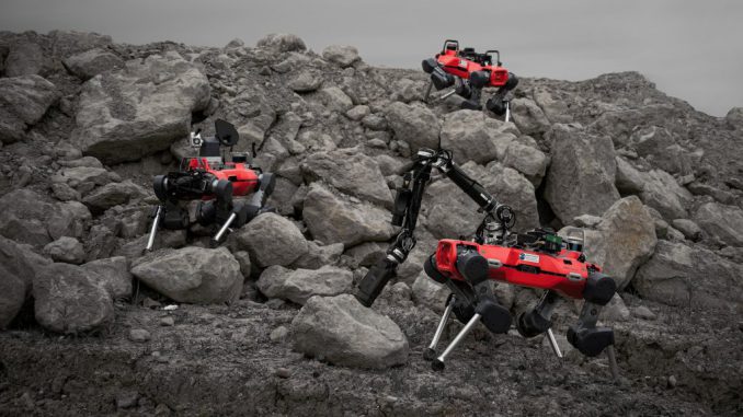 The trio of legged robots during a test in a Swiss gravel quarry. (ETH ZURICH/TAKAHIRO MIKI/SWNS) 