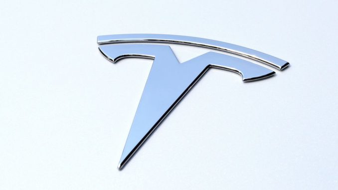 Logo of Tesla. Elon Musk's biographer Walter Isaacson shares insights on Cybertruck's design inspiration. MANNY BECERRA/ UNSPLASH. 