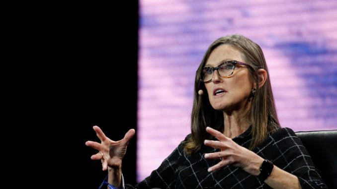 Wood, chief executive officer and chief investment officer, Ark Invest, gestures as she speaks during the Bitcoin 2022 Conference at Miami Beach Convention Center on April 7, 2022 in Miami, Florida.According to an analysis by Cathie Wood-led Ark Investment Management, EV giant Tesla Inc’s potential platform fees a href=https://www.Zenger News.com/analyst-ratings/analyst-color/21/12/24472514/why-cathie-woods-ark-sees-tesla-inching-toward-transforming-personal-car-from-a-strin autonomous ride-hailing/a could be much higher than previously estimated. PHOTO BY MARCO BELLO/GETTY IMAGES