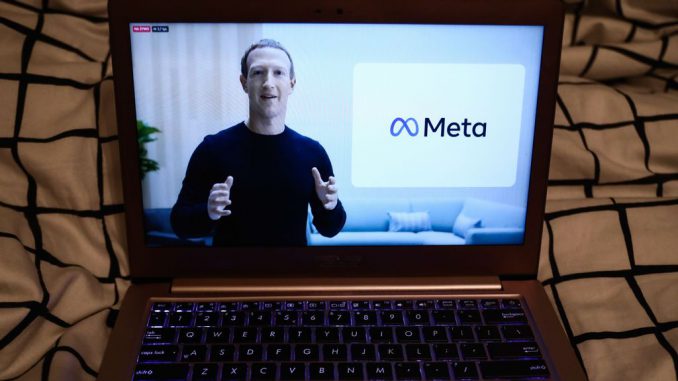 Mark Zuckerberg announcing the new name of the company and Meta logo are seen during Facebook Connect livestream displayed on a laptop screen in this illustration photo taken in Krakow, Poland on October 28, 2021. PHOTO BY JAKUB PORZYCKI/GETTY IMAGES 