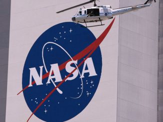 strongA helicopter provides security for the NASA astronauts as they are driven in their AstroVan to the space shuttle on May 31, 2008, in Cape Canaveral, Florida. The National Aeronautics and Space Administration's Heliophysics Science Division recently awarded NASA's Exceptional Achievement Medal to Israeli mission and instrument scientist Eliad Peretz, 40, for his contributions to several space missions. JOE RAEDLE/GETTY IMAGES/strong