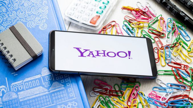 In this photo illustration a Yahoo logo seen displayed on a smartphone. Yahoo debuted as a public company in April 1996 and went on to become one of the most valuable internet services companies, with its search and email. (Photo Illustration by Mateusz Slodkowski/SOPA Images/LightRocket via Getty Images)