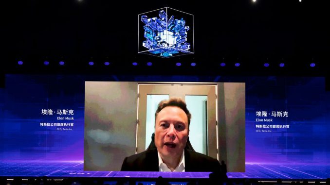 SHANGHAI, CHINA - JULY 06: Tesla CEO Elon Musk speaks via video during the opening ceremony of 2023 World Artificial Intelligence Conference at Shanghai World Expo Exhibition and Convention Center on July 6, 2023 in Shanghai, China.Elon Musk's move at Twitter to share ad revenue with creators and content producers signals a new paradigm in the growing a href=https://www.Zenger News.com/topic/twittercreator economy/a. PHOTO BY VCG/GETTY IMAGES