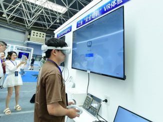 SUZHOU, CHINA - JUNE 27, 2023 - A visitor experiences in front of the industrial Safety training VR experience Center booth of a company's booth at the Meta Universe International Equipment Exhibition Hall, Suzhou, Jiangsu province, China, June 27, 2023. PHOTO BY CFOTO/GETTY IMAGES