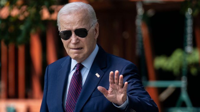 U.S. President Joe Biden waves to the press as he walks to Marine One on the South Lawn of the White House July 28, 2023 in Washington, DC. The Biden administration reportedly asked Facebook a href=https://www.Zenger News.com/news/23/06/32995937/us-intelligence-agencies-divided-on-wuhan-laboratory-origins-of-coid-19-wsjto remove COVID-19-related content/a that fueled theories about the virus' origin along with satirical content regarding the safety of vaccines. PHOTO BY DREW ANGERER