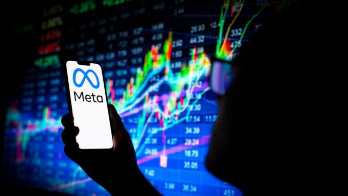 The Meta logo is seen on a phone screen with a stock market prices graph in the background in this illustration photo on 06 July, 2023 in Warsaw, Poland. PHOTO BY JAAP ARRIENS/GETTY IMAGES
