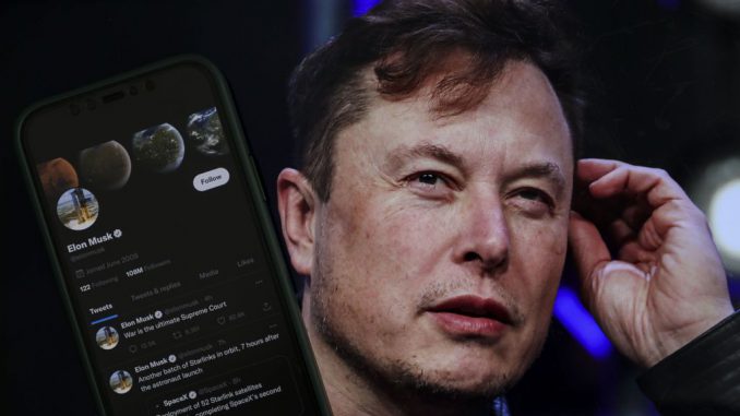 Elon Musk's twitter profile is displayed on a mobile phone and the image of him is seen on a computer screen on back of it in Ankara, Turkiye on October 06, 2022. Dittmann, Musk's vocal doppelganger on X, clarified that no AI tool was used during their conversation and that his voice was natural. MUHAMMED SELIM KORKUTATA/ANADOLU AGENCY.