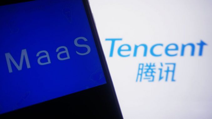 Photo taken on June 19, 2023, shows the logo of Tencent and the MaaS service in Hangzhou, Zhejiang province, China. On the same day, Tencent Cloud announced the MaaS panorama, relying on Tencent Cloud TI platform to create a large model selection store for the industry, providing customers with one-stop large model services. Based on Tencent HCC high-performance computing cluster and large model capabilities, Tencent Cloud announced that it has provided more than 50 large model industry solutions for more than 10 industries, including cultural tourism, government affairs, and finance. (Costfoto/NurPhoto via Getty Images)