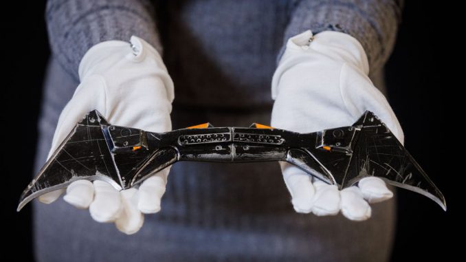 Batman's (Robert Pattinson) Batarang from The Batman, (2022) est £10,000 - 15,000 goes on view at the Propstore on September 08, 2022, in Rickmansworth, England. Over 1,500 rare and iconic lots will be sold during Propstore’s Entertainment Memorabilia Live Auction over four days from Thursday 3rd to Sunday 6th November 2022. (Tristan Fewings/Getty Images)