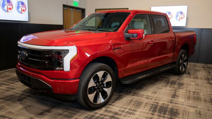 The 2023 Ford F-150 Lightning truck is shown after winning the NACTOY 2023 North American Truck of The Year Award at the 2023 North American Car, Truck, and Utility Vehicle of the Year Awards on January 11, 2023, in Pontiac, Michigan. The finalists were judged by a jury of 50 professional automotive journalists from the United States and Canada. (Bill Pugliano/Getty Images)