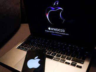 A laptop with Apple website displayed on a screen and Apple logo displayed on a phone screen are seen in this illustration photo taken in Krakow, Poland on June 5, 2023. PHOTO BY JAKUB PORZYCKI/GETTY IMAGES