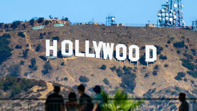 The Hollywood Sign in the process of being cleaned and repainted on September 21, 2022, in preparation for its 100th birthday in 2023. (AARONP/BAUER-GRIFFIN/GC IMAGES)