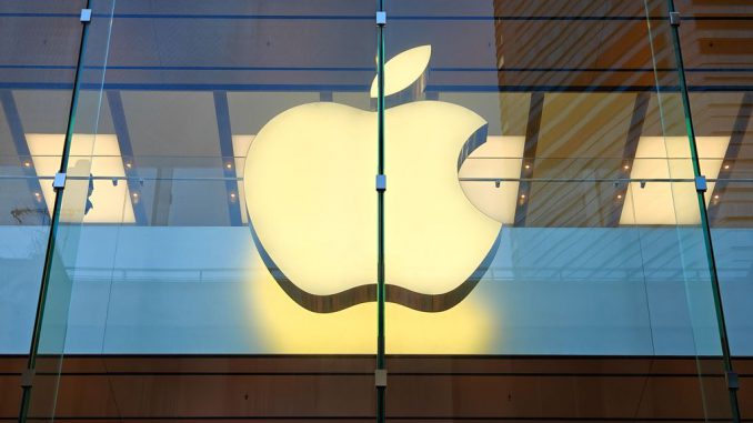 Customers walk past the Apple Store in Causeway Bay in Hong Kong, China. Apple has removed over a hundred ChatGPT-like apps from its China store, Air Canada (OTC: ACDVF) has announced plans to offer Apple TV+ programming on its flights, Apple is set to release its Q3 results, a critical moment for investors. CFOTO/FUTURE PUBLISHING VIA GETTY IMAGES.