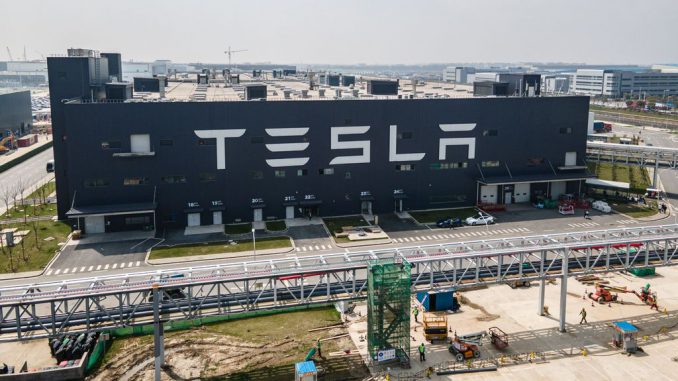 strongAn aerial view of Tesla Shanghai Gigafactory on March 29, 2021 in Shanghai, China. The electric vehicle pioneer made a series of price cuts early this year, sparking concerns about margins, as economic concerns affected demand for Tesla automobiles in 2022. XIAOLU CHU/GETTY IMAGES/strong