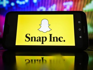 strongIn this photo illustration, a Snap Inc logo is displayed on a smartphone with stock market pricing in the background. OMAR MARQUES/SOPA IMAGES/LIGHTROCKET/GETTY IMAGES/strong