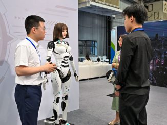 strongAn exhibitor introduces various functions of a front desk service robot to customers at the 2023 Kunshan Yuan Universe International Equipment Exhibition in Suzhou, Jiangsu province, China, June 27, 2023. Designed to handle unscripted communication tasks autonomously and proactively, Angel and Naomi use human-like thought processes to lead conversations instead of merely answering questions. And they get smarter with time and experience. CFOTO/FUTURE PUBLISHING/GETTY IMAGES/strong