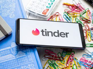 strongIn this photo illustration a Tinder logo seen displayed on a smartphone. Tinder saw a $475 million gain thanks to a 6% increase in direct revenue growthMATEUSZ SLODKOWSKI/SOPA IMAGES/LIGHTRICKET/GETTY IMAGES/strong