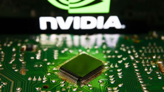 strongNvidia logo displayed on a phone screen and microchip and are seen in this illustration photo taken in Krakow, Poland on July 19, 2023. The Biden administration has pressed the pause button on Nvidia's microchip sales to the Middle East amid concerns about potential re-exports to China. JAKUB PORZYCKI/GETTY IMAGES/strong