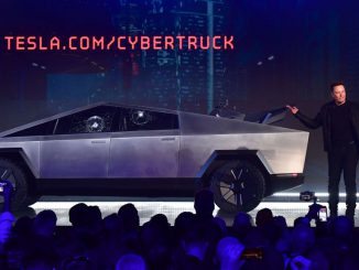 Tesla co-founder and CEO Elon Musk speaks in front of the newly unveiled all-electric battery-powered Tesla's Cybertruck with shattered windows, after a failed resistance test, at Tesla Design Center. Cybertruck, which has yet to be launched officially, has reportedly fetched $400,000 at an auction. FREDERIC J. BROWN/AFP VIA GETTY IMAGES.