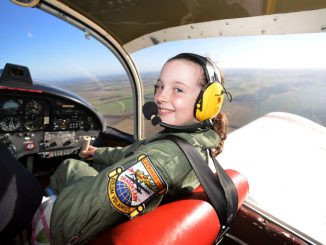 'Britain's former youngest female pilot is set to break another record when she flies a WWI warplane - built by pensioners who started the job before she was born. SWNS