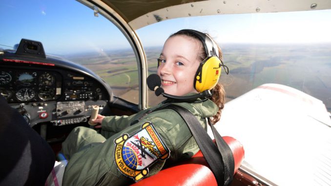 'Britain's former youngest female pilot is set to break another record when she flies a WWI warplane - built by pensioners who started the job before she was born. SWNS